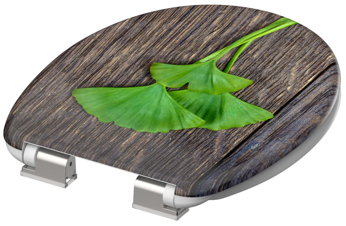 Mönstrad toalettsits universal i Duroplast - BĂTTRE. CC-mĂ„tt: 125-210mm LĂ€ngd: 425-435mm Bredd: 373mm.