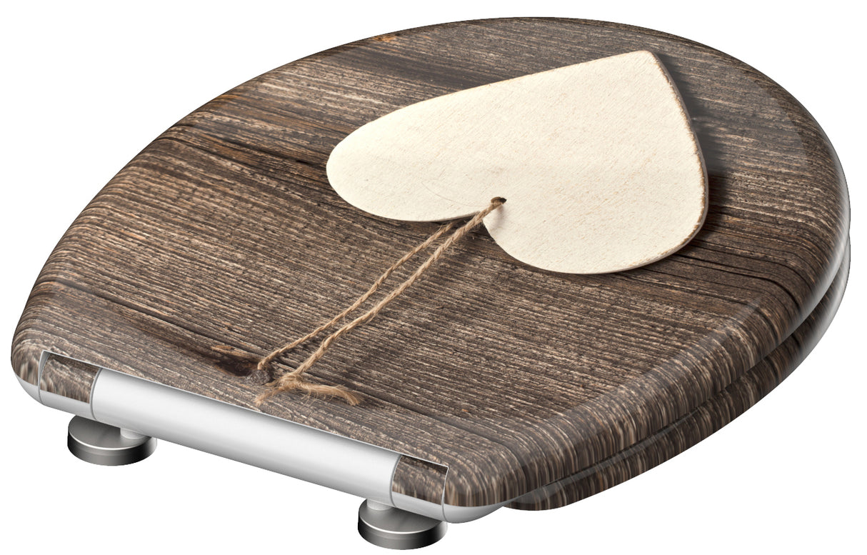 Mönstrad toalettsits universal i Duroplast - BĂST. CC-mĂ„tt: 90-190mm LĂ€ngd: 405-460mm Bredd: 375mm.